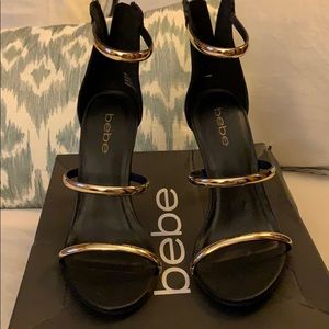 Bebe Berdine Black and Gold High Heel Shoe